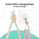 view.webp Hand holding Vega pumice stone for easy foot care